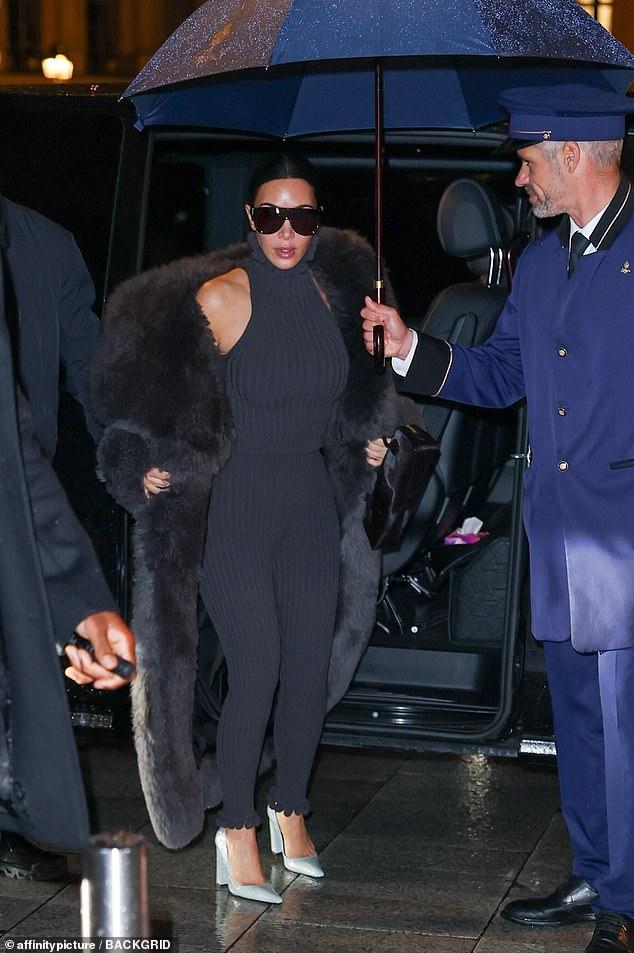 News Room : Kim Kardashian makes glamorous arrival in dramatic turtleneck top and fur coat during Paris Fashion Week