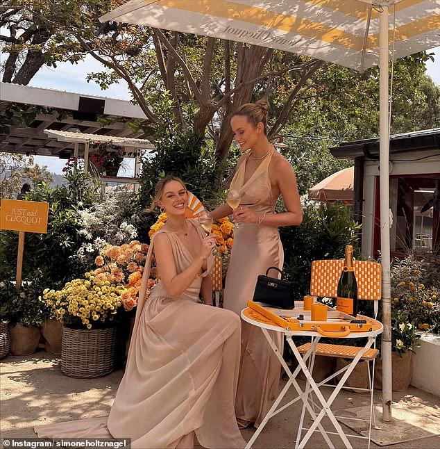 News Room : Twinning! Australia’s hottest sisters Simone and Madeline Holznagel show off their cleavage in matching gowns as they attend event at Justin Hemmes’ beachside venue