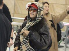 News Room : Guess who! Pop superstar attempts to go incognito as she touches down in Sydney