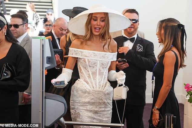 News Room : Rebecca Judd suffers awkward mishap as she attempts to enter the prestigious Birdcage on Derby Day