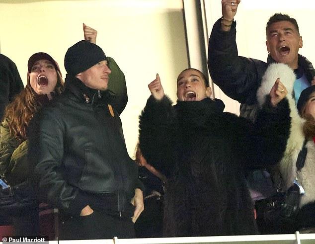 News Room : Chelsea fan Callum Turner fumes as Premier League rivals Arsenal thrash Aston Villa – while fiancée and Gunners fan Dua Lipa shrieks with delight