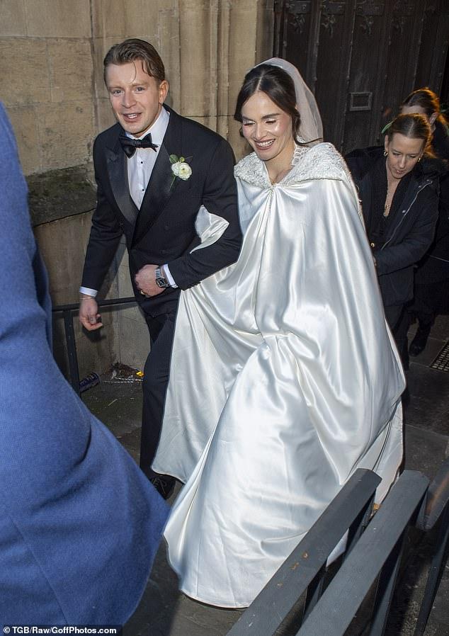 News Room : Holly Ramsay looked radiant in her billowing ivory gown… but as the wedding party was buffeted by the freezing wind, an even icier text was winging its way to her groom Adam Peaty