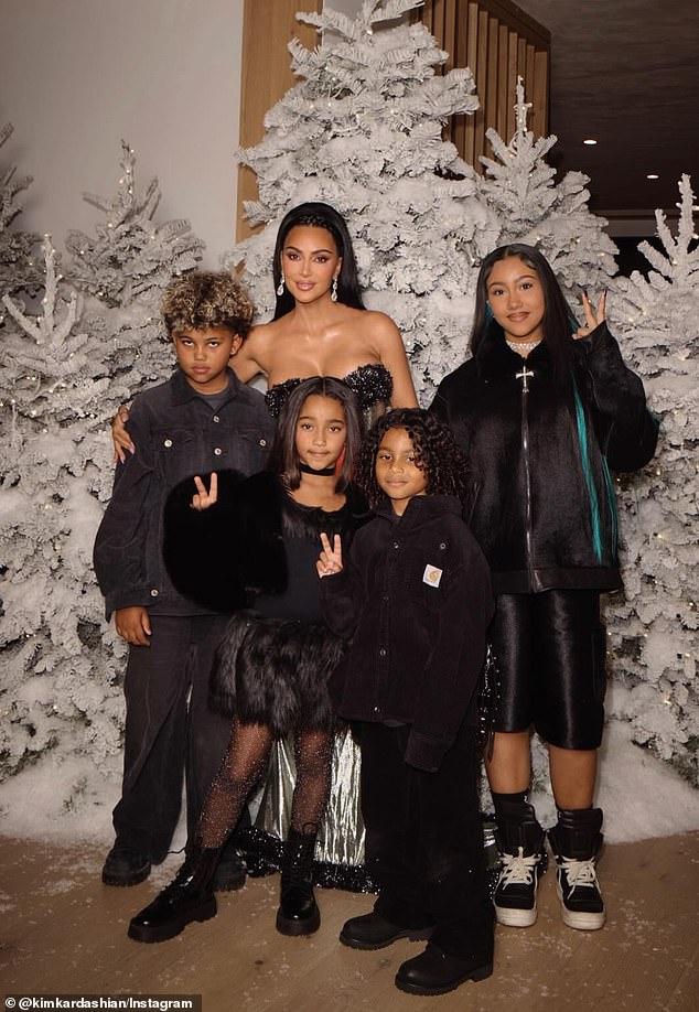 News Room : Kim Kardashian shares rare portrait with all four of her children for Christmas… and no sign of ex Kanye West