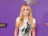 News Room Miley Cyrus shimmers in silver dress and