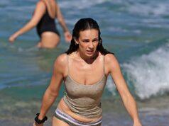 News Room : Abbie Chatfield strips down to her undies for an impromptu swim at the beach during her first week hosting The Kyle & Jackie O Show’s replacement breakfast program