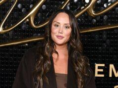 News Room : Charlotte Crosby stuns in a brown polka dot mini dress as she attends star-studded Michael screening