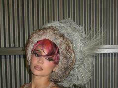 News Room : Kylie Jenner models furry bikini top and wild red wig in racy BTS images from magazine cover shoot