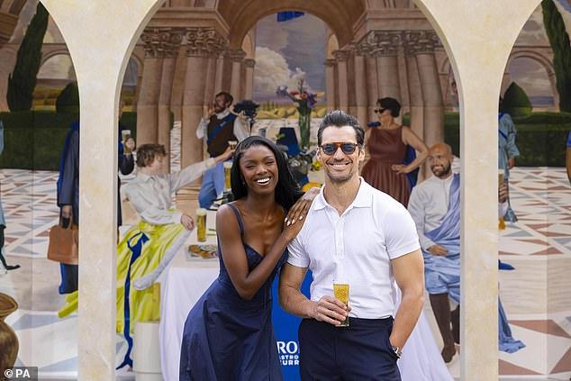 News Room : David Gandy and Leomie Anderson pour beers