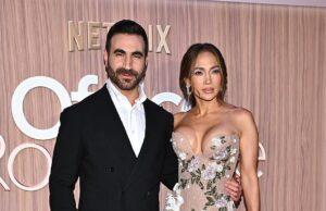 News Room : Jennifer Lopez nearly busts out of strapless floral gown as she cozies up to Brett Goldstein at Office Romance premiere in NYC… after addressing dating rumors News Room Jennifer Lopez nearly busts out of strapless