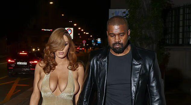 News Room : Kanye West’s wife Bianca Censori puts on eye-popping display in low-cut sparkly leotard and kinky boots for night out in Switzerland News Room Kanye Wests wife Bianca Censori puts on