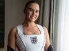 News Room : Kate Kane poses in custom England ‘corset’ ahead of Three Lions’ match in Mexico – as WAGs and fans wait for delayed match to kick off News Room Kate Kane poses in custom England corset