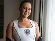 News Room : Kate Kane poses in custom England ‘corset’ ahead of Three Lions’ match in Mexico – as WAGs and fans wait for delayed match to kick off News Room Kate Kane poses in custom England corset