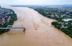 News Room : Cars plunge into river as super typhoon destroys Vietnam bridge News Room Cars plunge into river as super typhoon