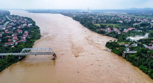 News Room Cars plunge into river as super typhoon