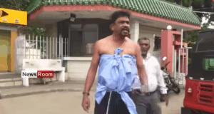 News Room : Half-Dressed Postal Worker Tears Into Minister Over ‘Strike Lies’