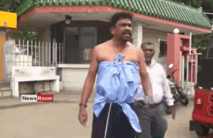 News Room : Half-Dressed Postal Worker Tears Into Minister Over ‘Strike Lies’