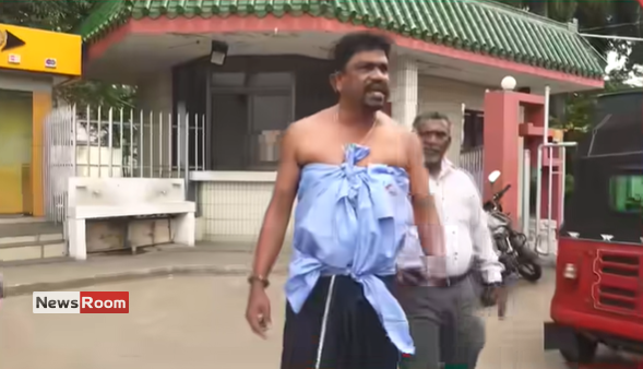 News Room : Half-Dressed Postal Worker Tears Into Minister Over