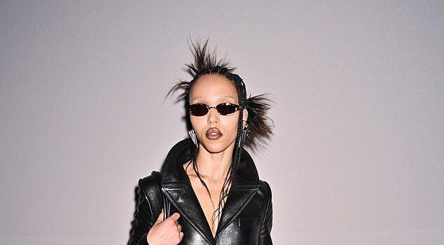 News Room FKA twigs goes topless beneath a stylish