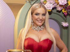 News Room : Geoffrey Edelsten’s ex-wife Brynne shows off her extreme cleavage in revealing red dress as she steps back into the spotlight after several reclusive years following the colourful millionaire’s death