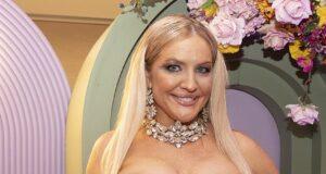 News Room : Geoffrey Edelsten’s ex-wife Brynne shows off her extreme cleavage in revealing red dress as she steps back into the spotlight after several reclusive years following the colourful millionaire’s death