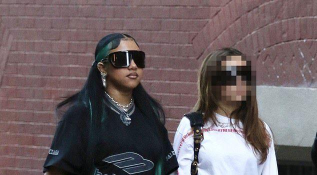 News Room Kim Kardashians daughter North West wears huge