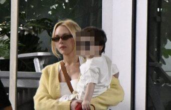 News Room : Lindsay Lohan looks chic in white mini dress as she carries son Luai, 2, on Miami outing with husband Bader Shammas News Room Lindsay Lohan looks chic in white mini