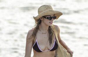 News Room Bikini clad Madeline Holtznagel gets a kiss from