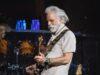 News Room : Bob Weir dead at 78: Grateful Dead founding member and guitarist passes after cancer battle OLD MAN PLAYING GUITAR AT CONCERT, MUSICIAN PERFORMING ON STAGE.