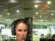 News Room : Candice Warner reveals next big ‘cutthroat’ career move: ‘I’m very goal driven’ Woman broadcasting live at a radio station studio in a modern office environment.