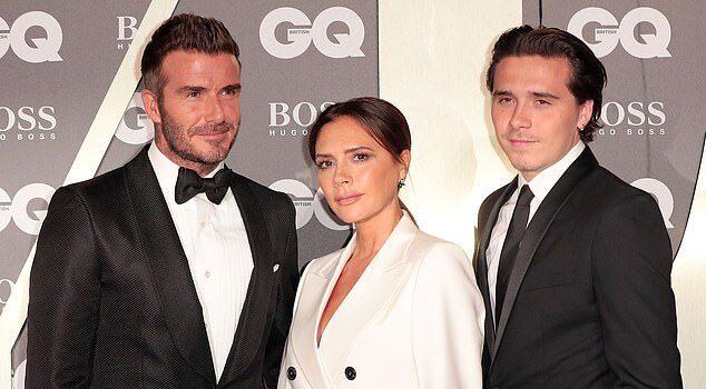 Elegant trio in formal black and white attire at a GQ event in Sri Lanka.