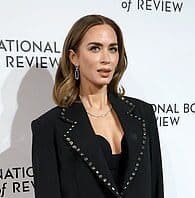 Elegant woman in black blazer at Lanka News Room event for latest Sri Lanka news.