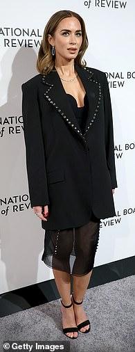 News Room : Emily Blunt wows in plunging bodysuit alongside