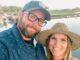 News Room : HGTV star sets record straight on her relationship with husband after announcing engagement to new man Smiling couple outdoors by water, enjoying the moment on a sunny day.