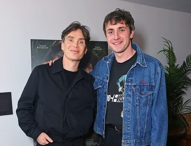 Actor Hugh Grant with a young fan at a promotional event in Sri Lanka.