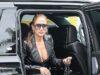 News Room : Jennifer Lopez, 56, wears bizarre braless look for high-end shopping trip in LA Elegant woman in black leather jacket and sunglasses stepping out of a luxury vehicle.