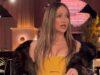 News Room : Jennifer Lopez pokes fun at her ex Ben Affleck’s couple nickname as she glams up for Golden Globes promo Elegant woman in a yellow dress and fur jacket at a glamorous event, holding a handbag and sunglasses.