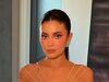 News Room : Kylie Jenner and Ariana Grande bring old Hollywood glamour on Golden Globes 2026 red carpet alongside Selena Gomez and Kate Hudson Glamorous woman in gold dress at a formal event.