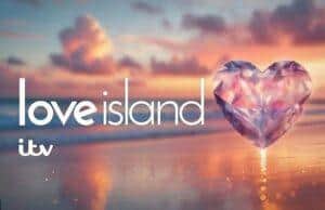 Heart-shaped gem on a beach at sunset, promoting Love Island TV series.