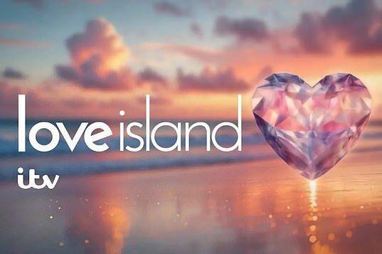 Heart-shaped gem on a beach at sunset, promoting Love Island TV series.
