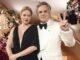 News Room : Mark Ruffalo, Natasha Lyonne and other stars protest Renee Good death with ‘ICE Out’ pin at 2026 Golden Globes Elegant couple at a glamorous event, dressed in formal attire with floral decor in the background.
