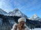 News Room : Rosie Huntington-Whiteley shows off her incredible physique as she braves the snow in a bikini for latest Alo photoshoot Hot woman in winter landscape in bikini and fur hat, snowy mountains in background, scenic outdoor photo.