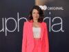 News Room : Sydney Sweeney’s Euphoria co-star accuses Lyft driver of stealing package filled with $1,000 in cash Vibrant pink blazer and shorts suit fashion model at Lanka News Room event.