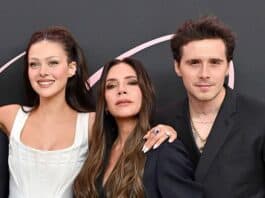 Three stylish individuals posing for a photo at a media event in Sri Lanka.