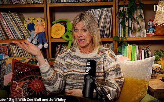 A woman speaking during interview with bookshelf background, colorful toys, and decor.