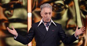 News Room : BAFTAs host Alan Cumming thanks audience for understanding as Tourette’s sufferer yells racial slurs during ceremony before leaving halfway through