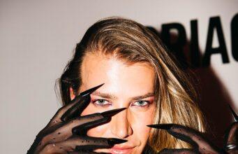 News Room : Christian Wilkins bares chest and dons long sheer gloves with razor sharp nails as he steps out in edgy ensemble at Peggy Gou’s VIP DJ set in Sydney News Room Christian Wilkins bares chest and dons long