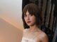 News Room Emilia Jones exudes elegance in a pale