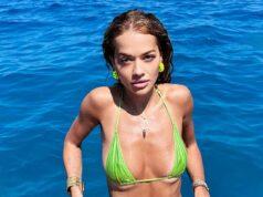 News Room : Rita Ora sends pulses racing in a skimpy neon green bikini as she soaks up the sun in Australia