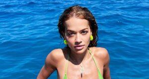 News Room : Rita Ora sends pulses racing in a skimpy neon green bikini as she soaks up the sun in Australia