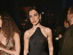 News Room : Dua Lipa is the epitome of chic in a sculpted black corset and skirt as she leads the stars at Warner Music’s swanky BRITs afterparty following her surprise onstage performance
